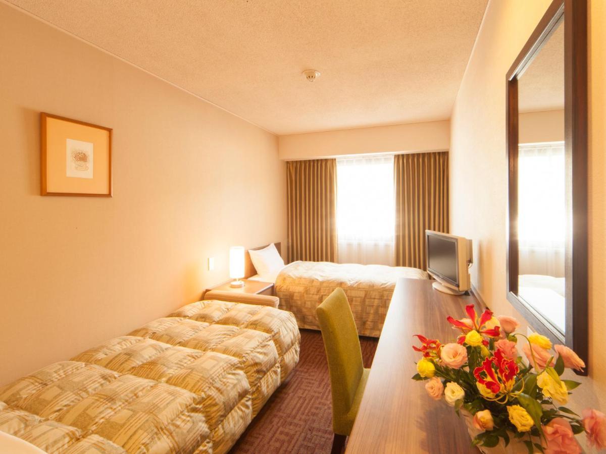 Hotel Pearl City Kesennuma Стая снимка