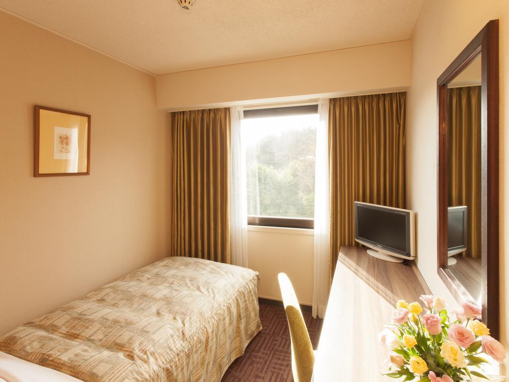 Hotel Pearl City Kesennuma Стая снимка